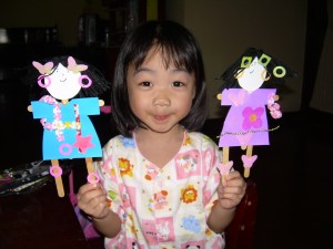 Making her own Puppets